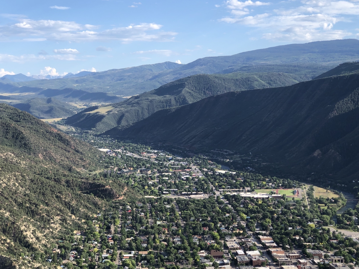Aerial view of Glenwood Springs, Colorado, featuring the world\'s largest hot springs pool